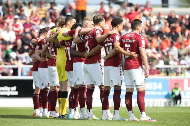 Cobblers line up as a team before kick-off. Pictures: Pete Norton.