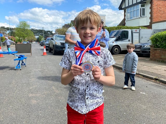 Announcing the junior bake-off champion of Greenfield Avenue, seven-year-old Joshua!