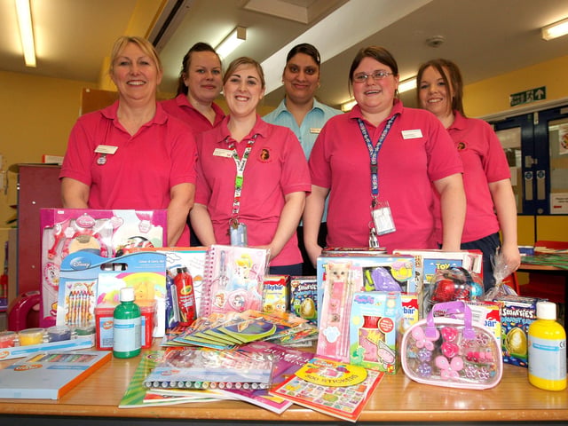 2010 - Suki Perhar from the Green Man Inn in Brackley Hatch, donating  Easter eggs and toys to the children's ward at Northampton General Hospital.  Pictured: Sue Faulkner, play service co-ordinator, Kate Hainsworth, nursery nurse, Kellie Rhucroft, play specialist children's unit, Suki Perhar, from the Green Man Inn, Nicola Hughes, hospital play specialist and Rebecca Coles, nursery nurse, children's outpatients.