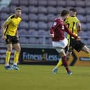 Marc Leonard fires home from long-range to give Cobblers the lead against Burton.