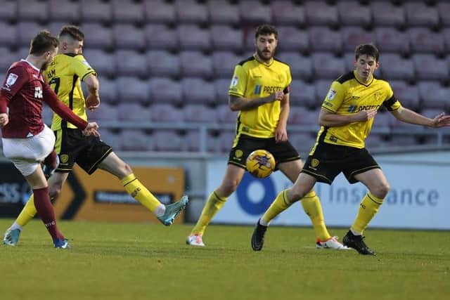Marc Leonard fires home from long-range to give Cobblers the lead against Burton.