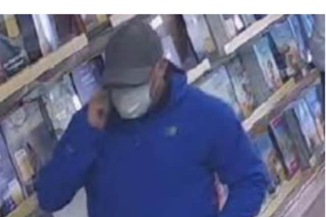 Darren Wykes entering a travel agent in Skegness to purchase £4,000 in foreign currency using a stolen debit card/Lincs Police