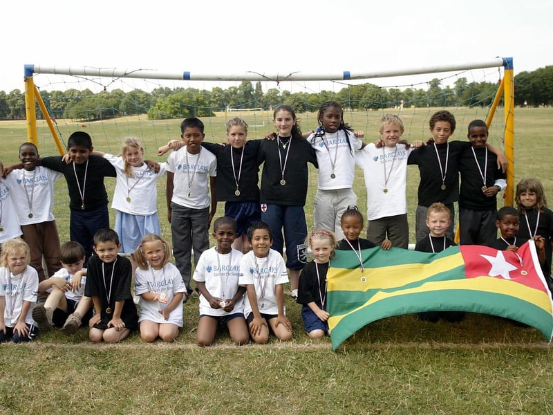 2006 - Castle Primary School ' World Cup Finals.' Pictured: The winners and runners up with their medals.