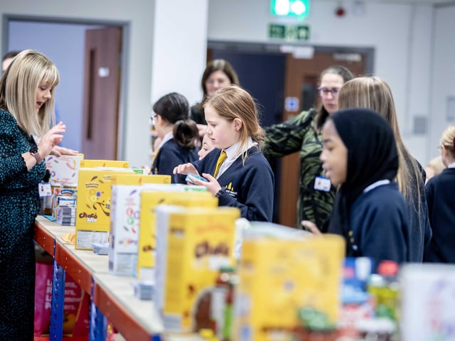 70 bags of food were packed by the 11 hardworking students, who learnt the importance of showing kindness and empathy to the community.