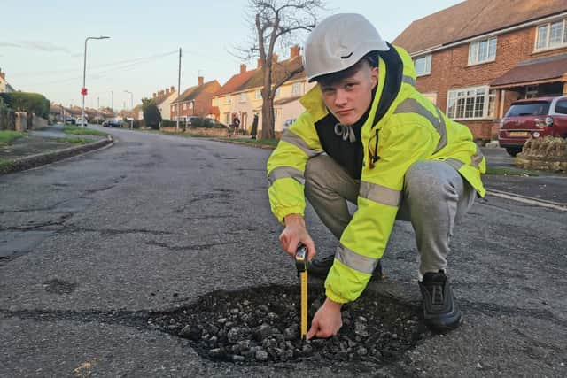 Residents are unhappy with huge potholes in a busy road in Harpole