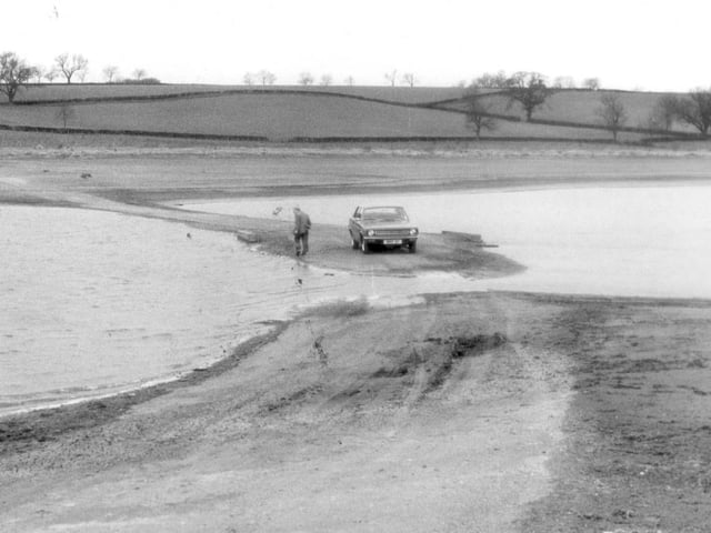 The reservoir that had been built 20 years before dried up enough that cars could use previously submerged roads