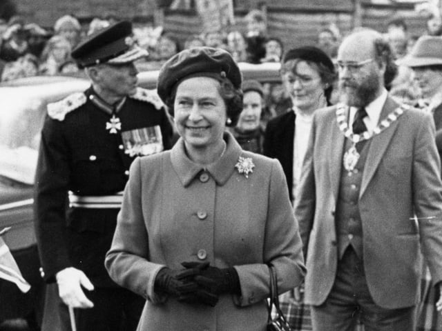 The Queen In Corby with council chairman Jim Thompson and Lt Col John Chandos-Pole.