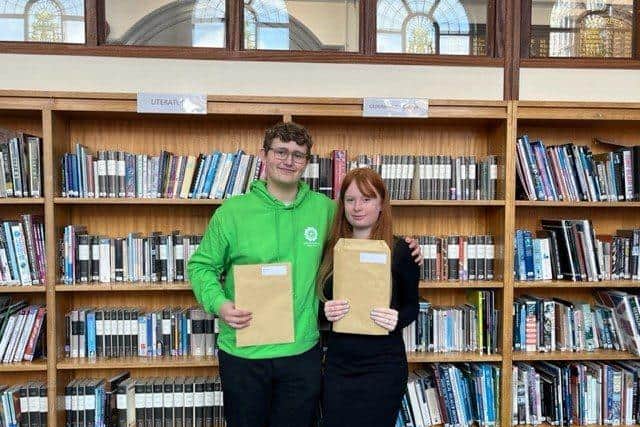 Leon Humphries and Erin James collect their results