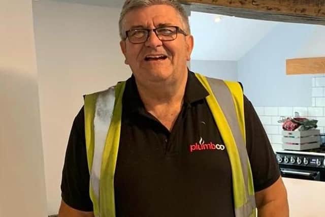 Mick in his Plumbco uniform