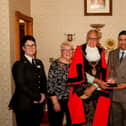 Naz Islam receiving his award from the Mayor of Northampton, Cllr Dennis Meredith
