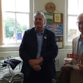 Nick Matthews chair of Co-opsUk (left) presenting Co-operative lifetime to Roger Sawtell in 2019
