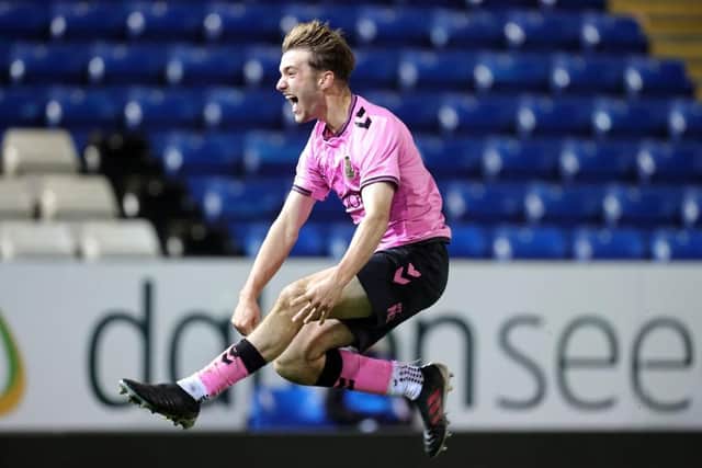 Reuben Wyatt jumps for joy after his winning goal.