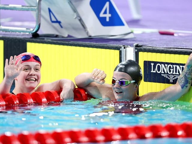 Maisie Summers-Newton spots her family in the crowd after winning gold at the 2022 Commonwealth Games