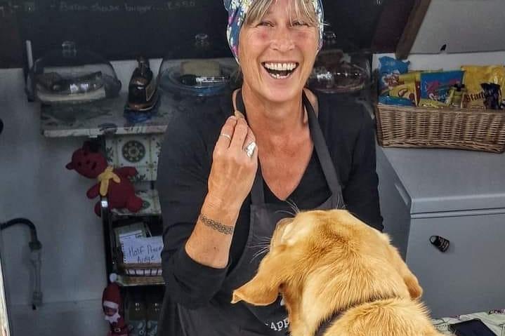 Daisy pictured with a customer.