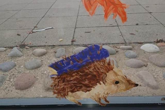 The 17-year-old says she loves to find new ways to be creative, which is why she was eager to take on this project as she had never painted on glass before.