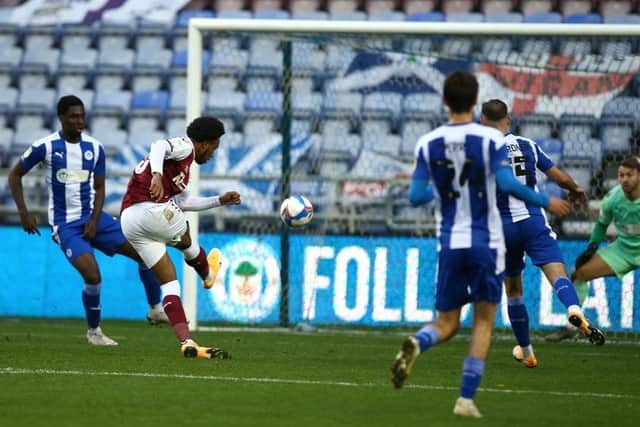 Caleb Chukwuemeka scores Town's third goal during the Sky Bet League One match between Wigan Athletic and Northampton at the DW Stadium in 2020. (Photo by Pete Norton/Getty Images)