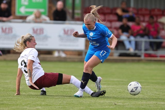 Peterborough's Katie Middleton is tackled by Vicky Barrett