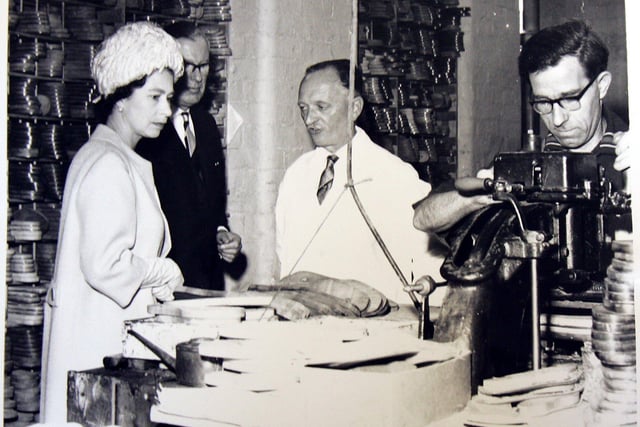 The Queen visits Churches shoe factory.