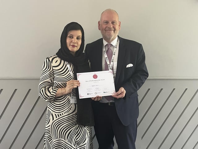 Councillor Jonathan Nunn from West Northants Council presenting Syrah Nazir, who works for WNC & Space to Talk, with a Rose of Northamptonshire Award. Syrah Nazir works to support refugees in Northamptonshire, is a Trustee at Northamptonshire Community Foundation, and supports several local charities, consistently promoting diversity and inclusivity across the county.