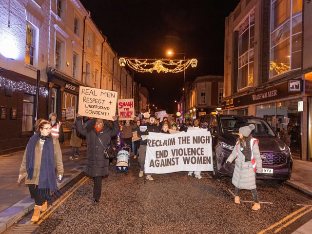 Activists joined the march on Friday November 28 to stand against violence towards women and girls.