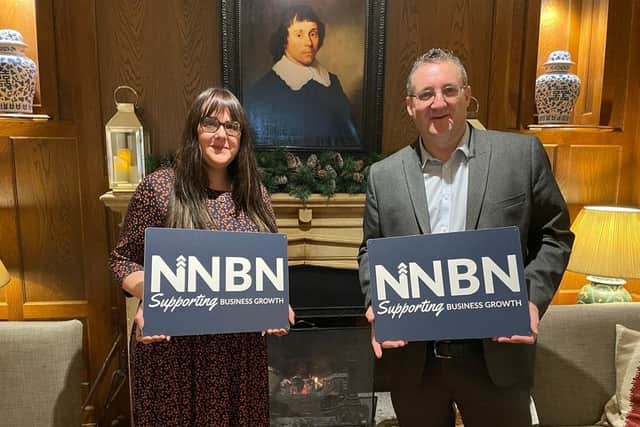 Simon Cox and Marie Baker, founders of NNBN, prepare to welcome the Minister