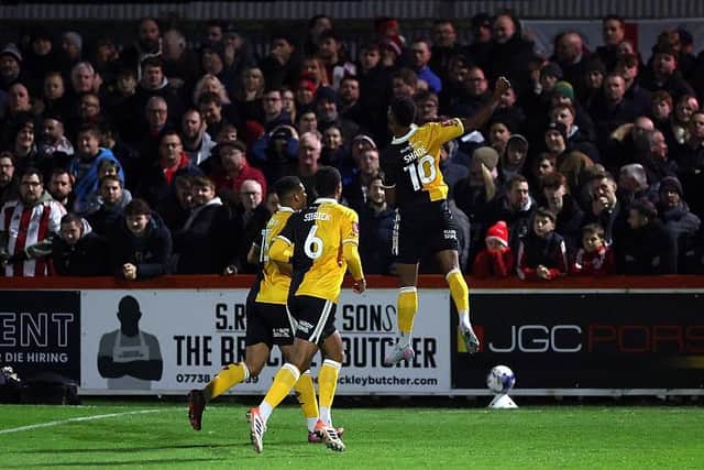 Burton Albion's Tyrese Shade celebrates the first of his three goals against Brackley Town (Photo by David Rogers/Getty Images)