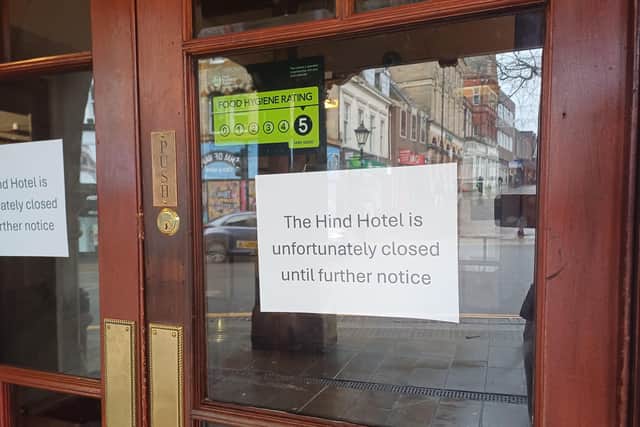 Signs have gone up in the door of the hotel in Sheep Street, Wellingborough