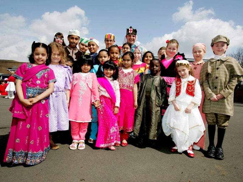 Castle Primary School in Semilong celebrate their 1st year at their new school with a day of cultural events including St. George and the dragon and African Drumming. Children dressed in traditional clothing.