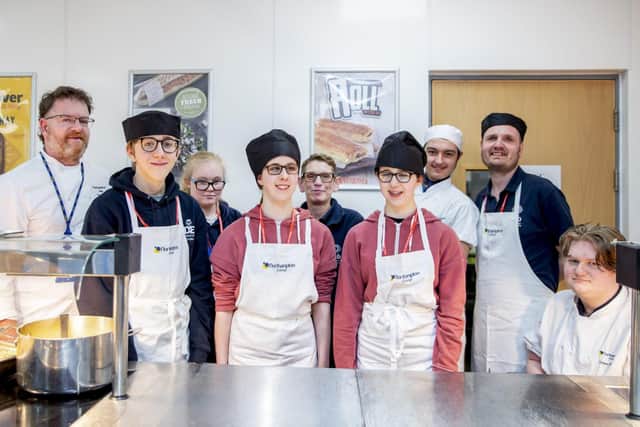 Students at Northampton College helped representatives from Northamptonshire Association for the Blind learn how to cook for themselves