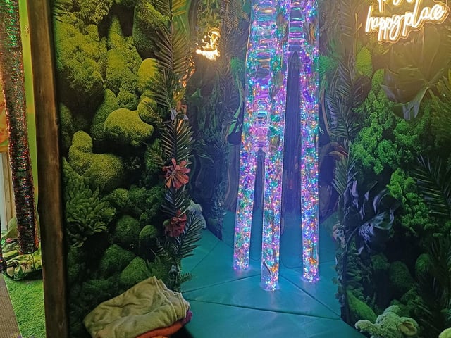 Sensory lights and materials make the space interactive for the children.