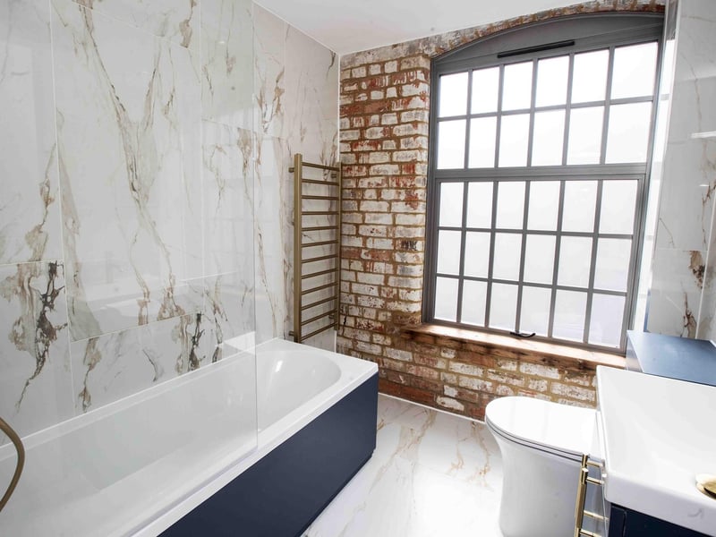 The Grade II listed former shoe factory has been converted into 89 stylish apartments by the OEH Group