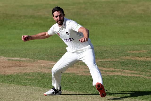 Ben Sanderson threatens a run-out on his follow through while bowling for Northants against Warwickshire