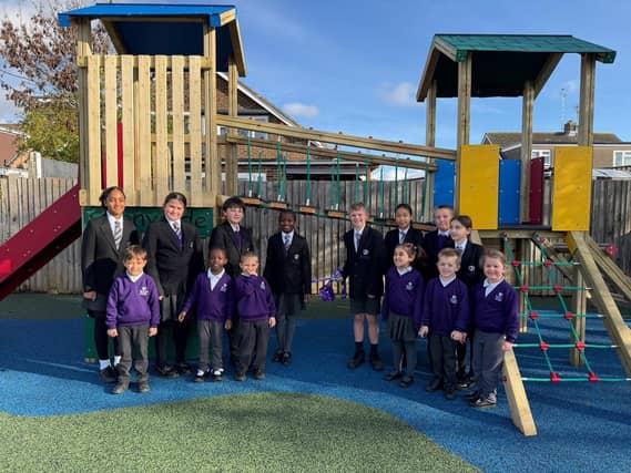 Our Pupil Leadership Team opening the outdoor learning equipment with our EYFS pupils.