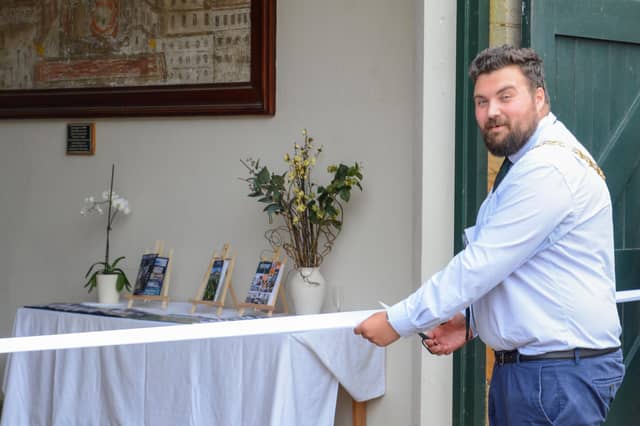 The Mayor of Kettering Town, Councillor Ben Jameson is cutting a ribbon cutting ceremony to officially open Mind Climate