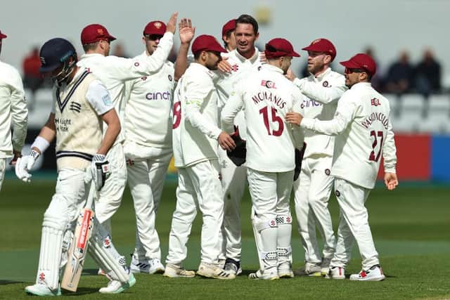 Chris Tremain of Northants celebrates with team mates after taking the wicket of Max Holden during the LV= Insurance County Championship Division One win over Middlesex at Wantage Road in April (Picture: David Rogers/Getty Images)