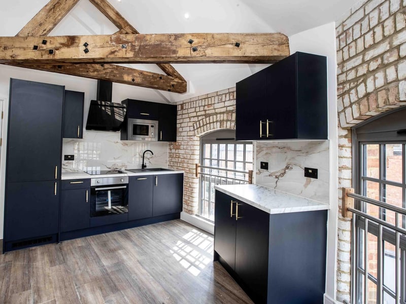 The Grade II listed former shoe factory has been converted into 89 stylish apartments by the OEH Group