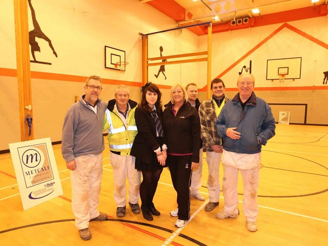The school hall at Thomas Becket School which has been given a makeover by Metcalf Decoratives. Pictured: Stuart Hamer, Dave Welford, Olivia Pudelko, 16, who entered the design to the Chron, Jan Melling, joint director of learning for PE, Steve Collis, Gareth Harris and Fred Haycock.