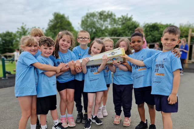 Pupils across East Midlands Academy Trust take part in the EMAT Torch Relay