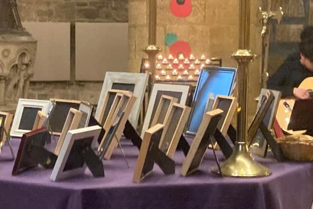 28 candles were lit to remember the people tragically killed on our county’s roads in 2023, and the same number of empty picture frames were displayed at the front of the church.