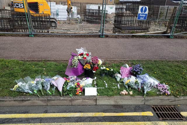 Floral tributes left at the scene near to the University of Northampton campus.