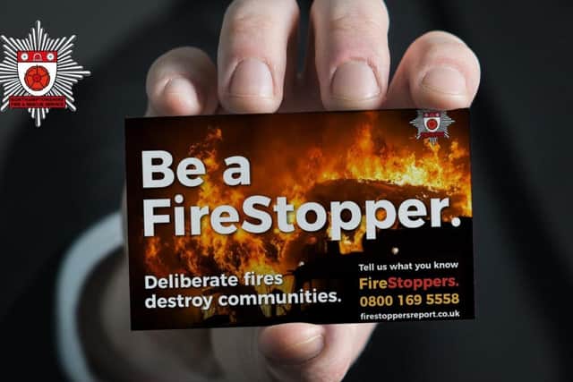 Firestoppers business card with contact details