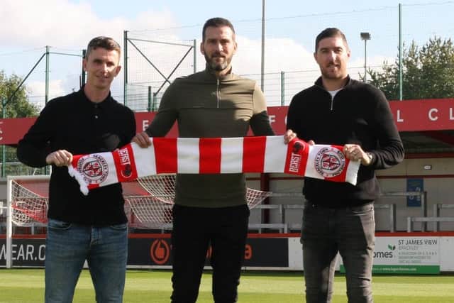 New Brackley boss Roger Johnson with his management team of Kevin Foley (left) and Stephen Ward