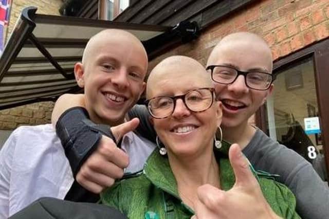 Pictured: Rachel and her two sons, William and James, who shaved their heads to support their mum.