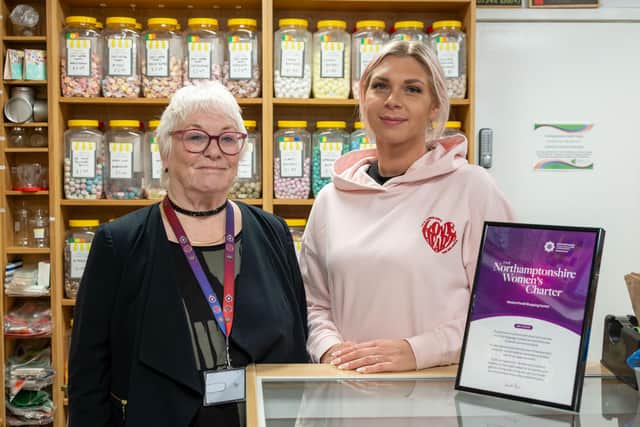 Commissioner Danielle Stone and Wendy's Sweet Shop staff member Ewelina