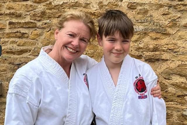 Associate Professor Dr Tracey Redwood and her son Harry. Both are now Karate black belts.