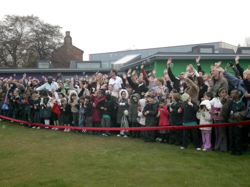 The official opening of Castle Primary School's new site. Pictured: Staff, pupils and parents at the opening