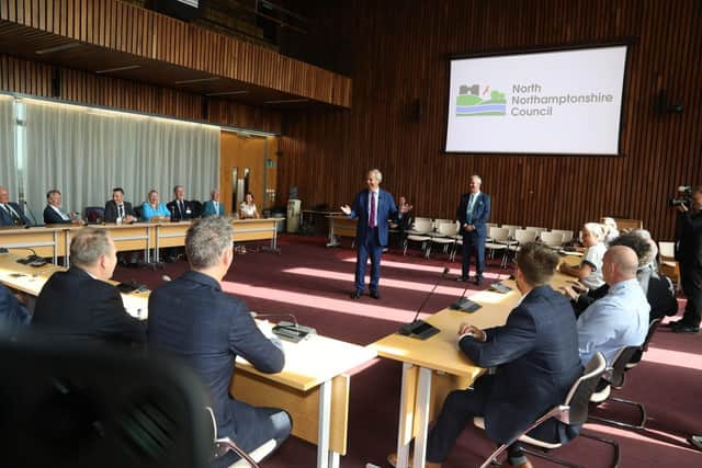 Reform UK leader Nigel Farage with leader of North Northants Council Cllr Martin Griffiths and Reform councillors at the Corby Cube/National World