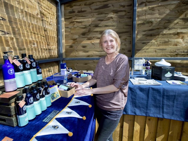 Rachel Dennis selling Neal’s Yard Remedies products.