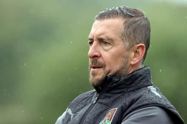 Cobblers boss Jon Brady watches his team in action during their 2-1 pre-season win at Brackley Town on Saturday (Picture: Pete Norton/Getty Images)