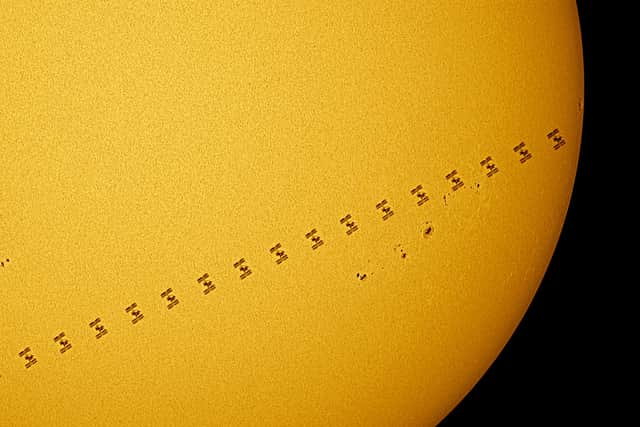 The Space Station is seen crossing the Sun in these astonishing images taken from a back garden near Daventry on Friday.